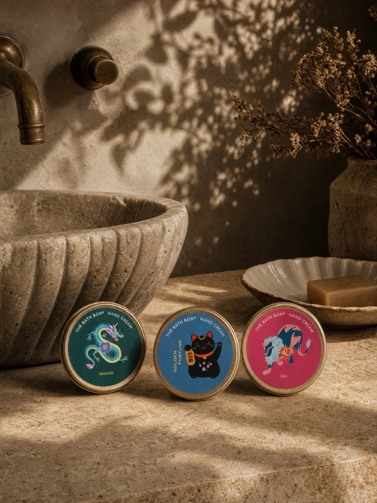 A Minis Hand Cream tin held in hand, showing its illustrated collectible design.